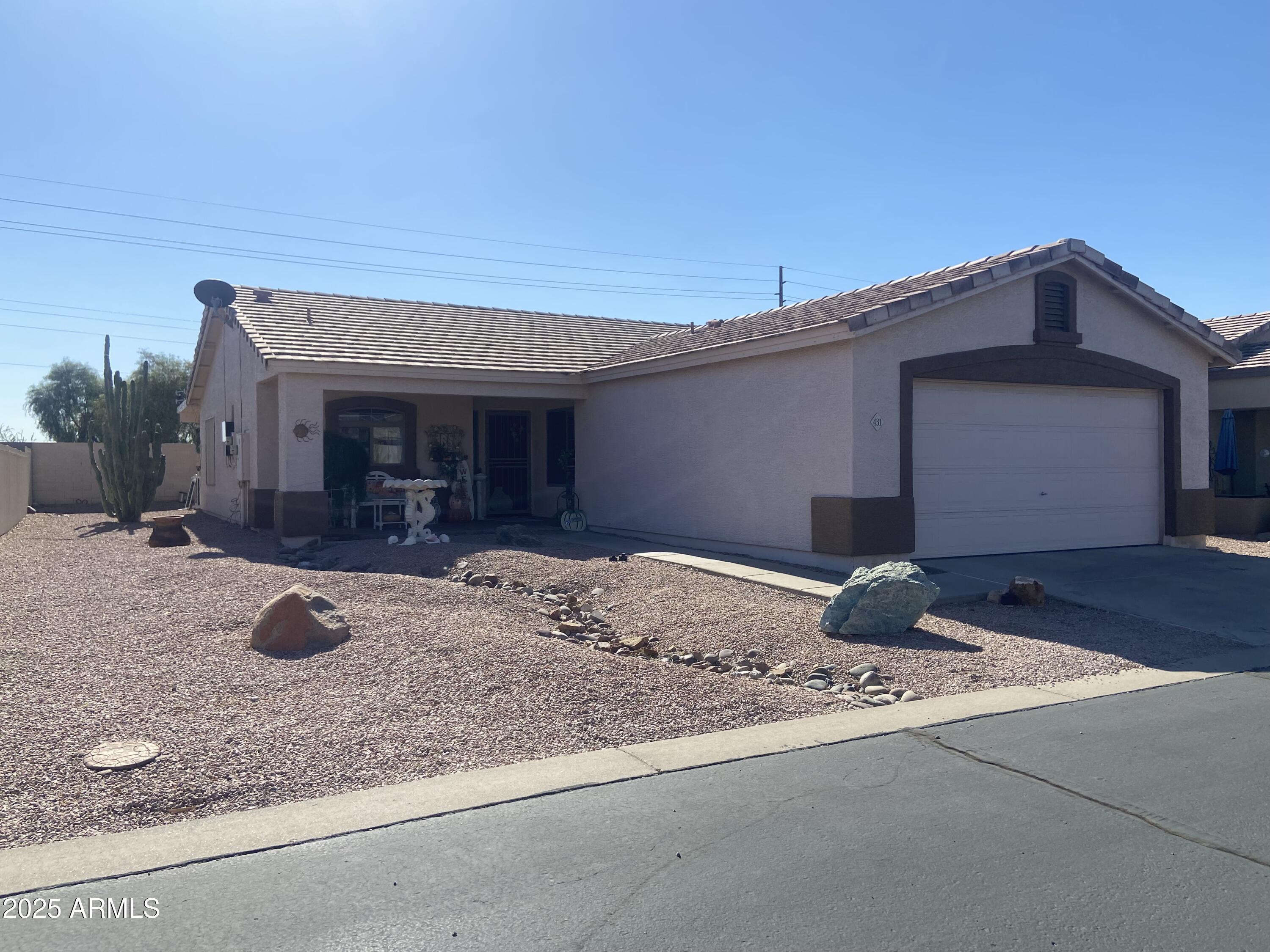 2101 South Meridian Road, Unit 431 Apache Junction, AZ 85120 - Photo 1 of 26 a view of a house with porch