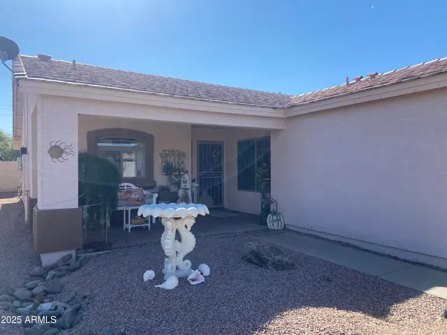 a view of a living room and balcony