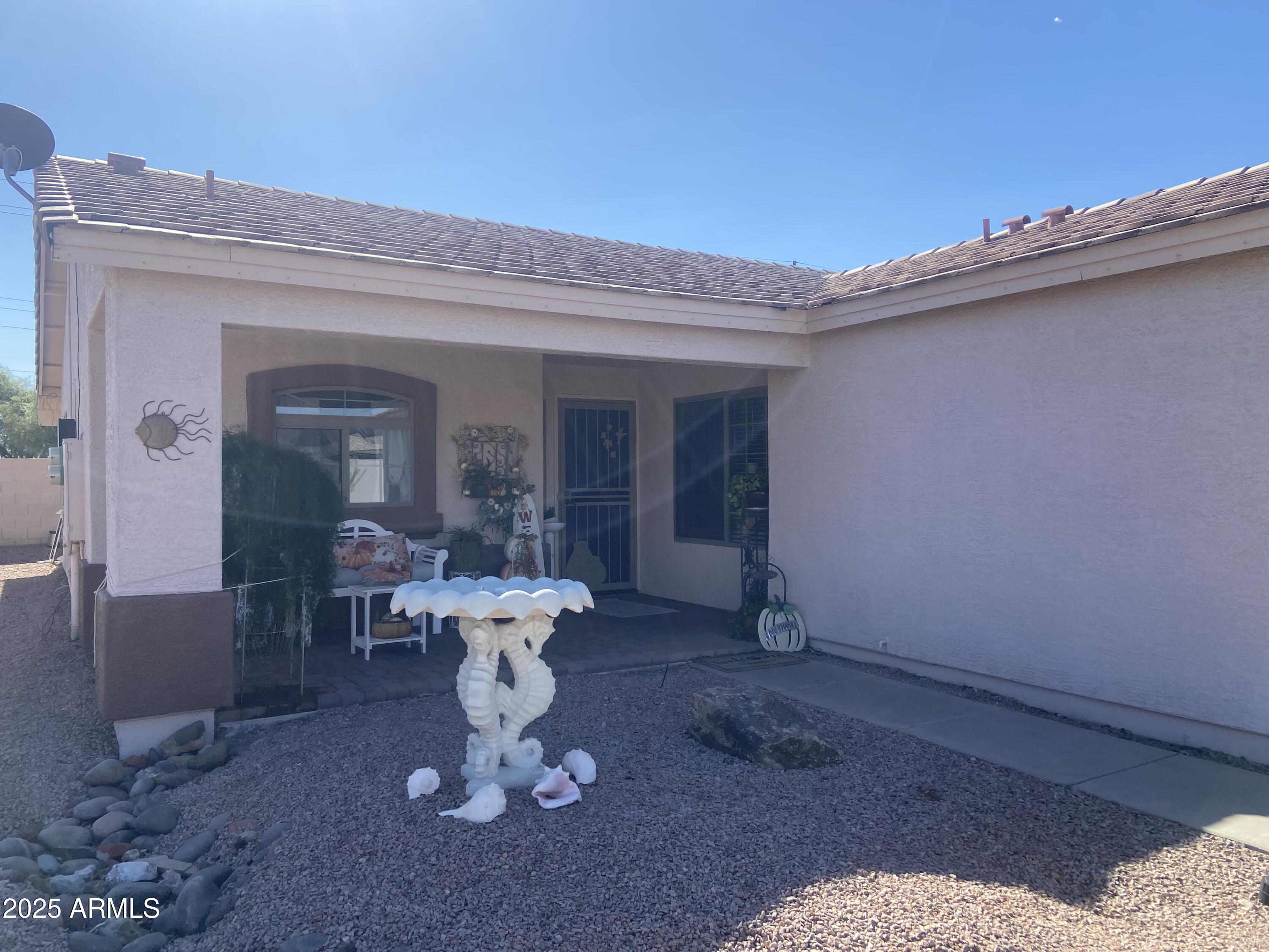 2101 South Meridian Road, Unit 431 Apache Junction, AZ 85120 - Photo 18 of 26 a view of a living room and balcony