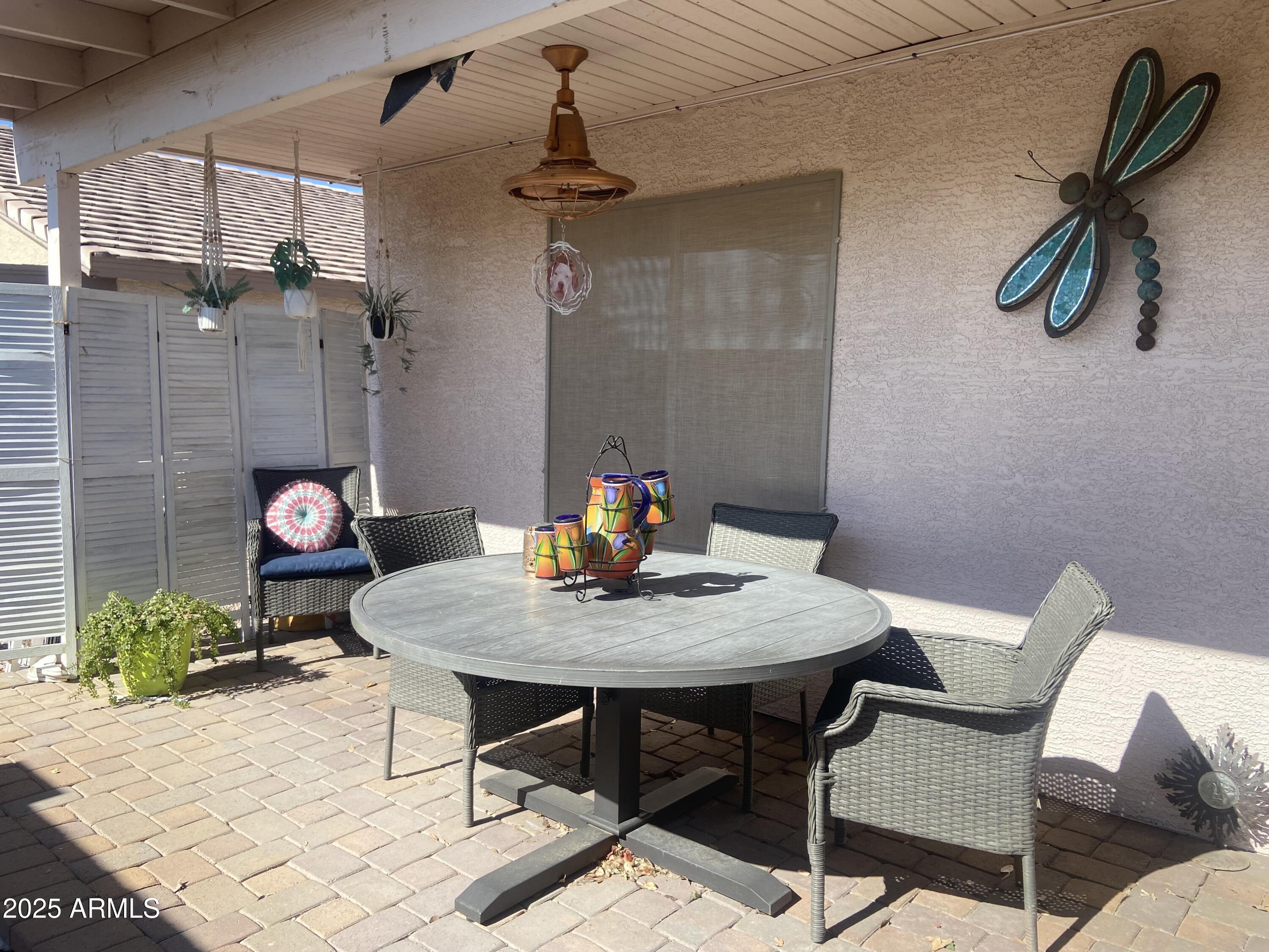 2101 South Meridian Road, Unit 431 Apache Junction, AZ 85120 - Photo 21 of 26 a view of a dining room with furniture and wooden floor