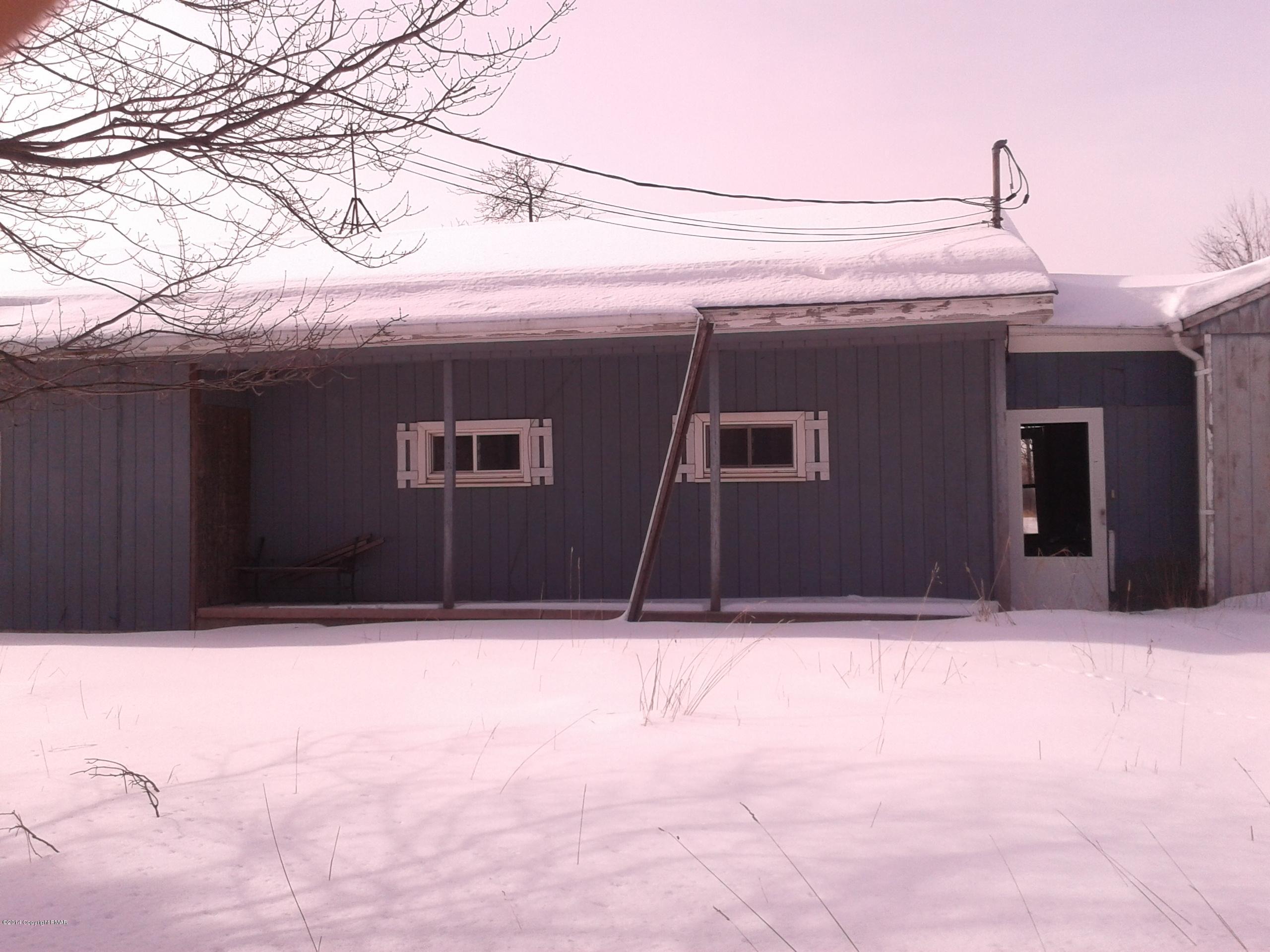 2748 Locust Ridge Road Pocono Lake, PA 18347 - Photo 1 of 1 a view of wooden house