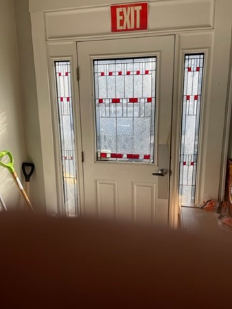 233 Appleton Street Lowell, MA 01852 - Photo 5 of 6 a view of empty room with windows