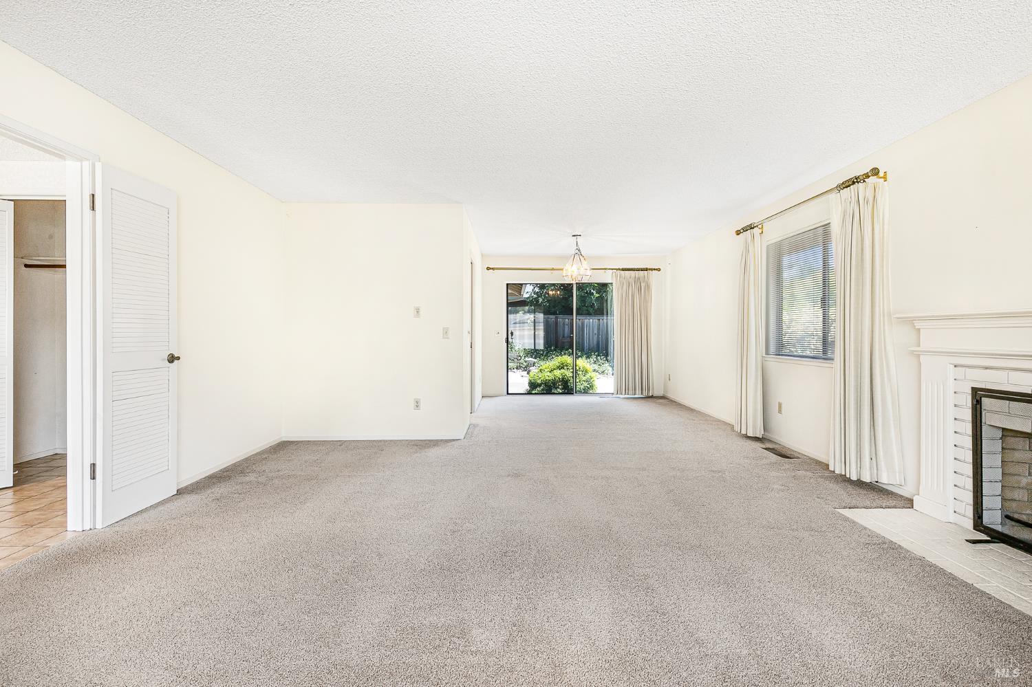 138 Oak Shadow Drive Santa Rosa, CA 95409 - Photo 12 of 50 an empty room with fireplace