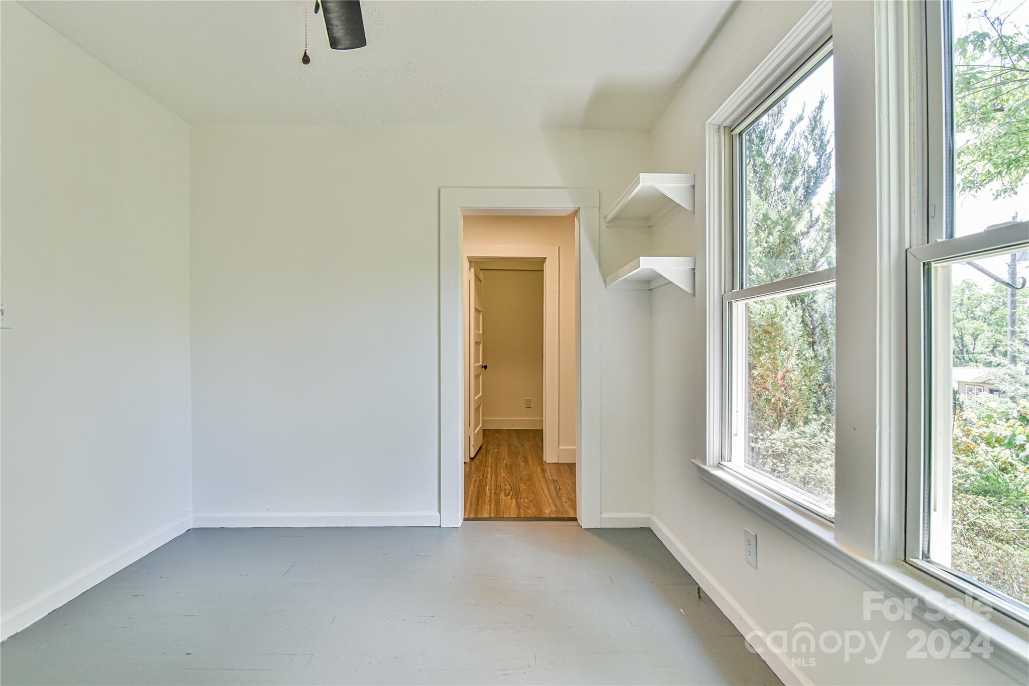 210 East Oakview Road Asheville, NC 28806 - Photo 14 of 31 a view of an empty room with a window