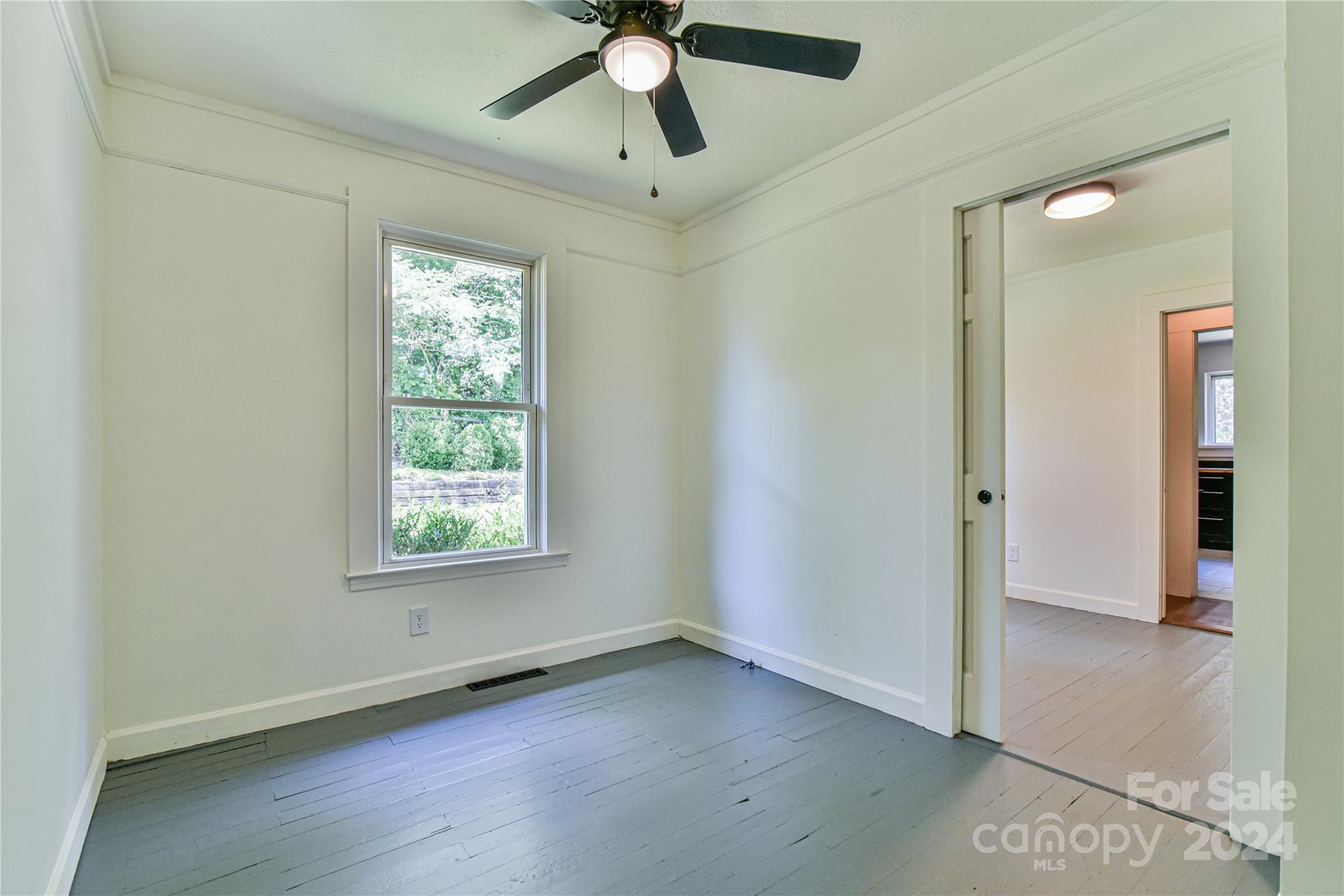 210 East Oakview Road Asheville, NC 28806 - Photo 19 of 31 a view of an empty room with a window