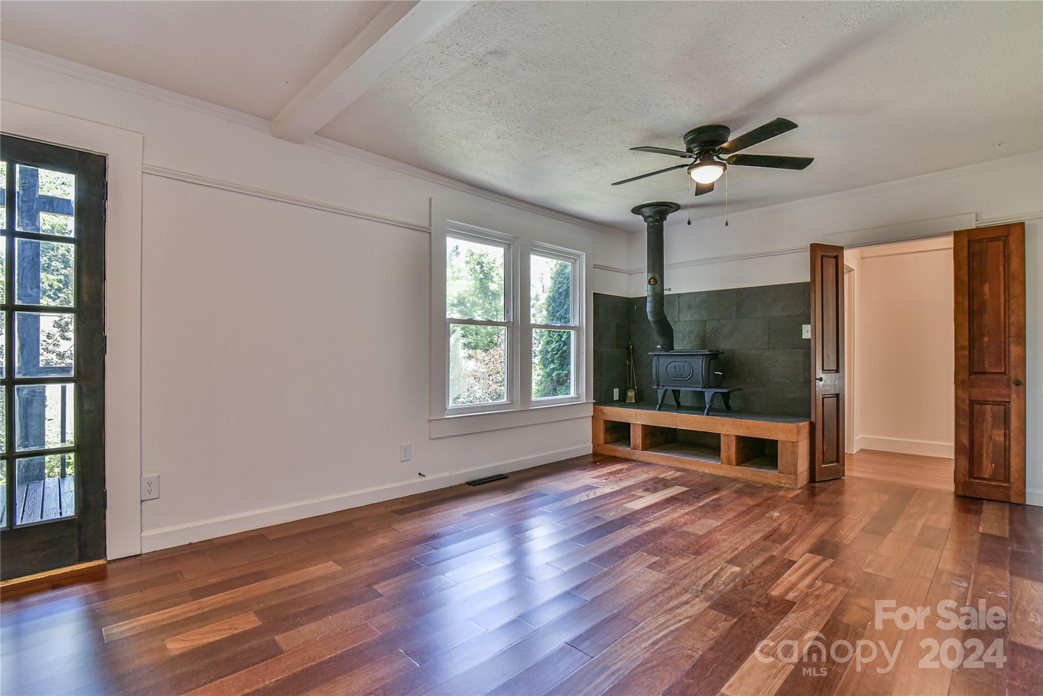 210 East Oakview Road Asheville, NC 28806 - Photo 6 of 31 wooden floor in an empty room with a window