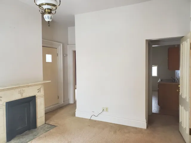 a view of a livingroom with a fireplace