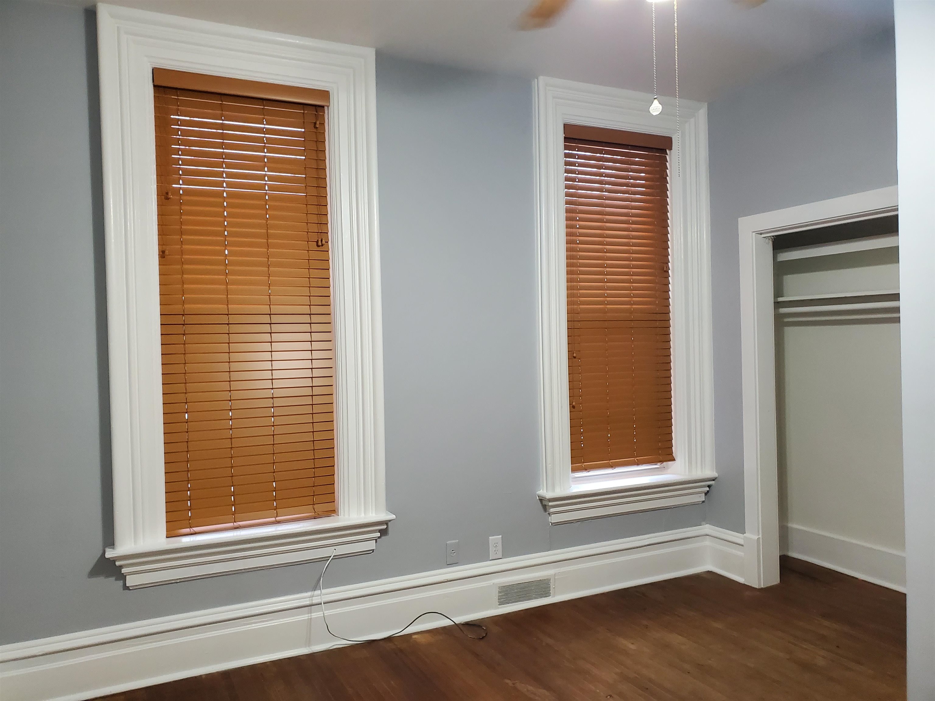 400 North 4th Street Oregon, IL 61061 - Photo 10 of 24 a view of an empty room with wooden floor and a window