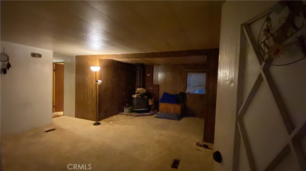17698 Walker Mine Road Redding, CA 96003 - Photo 21 of 29 a view of a hallway with wooden floor