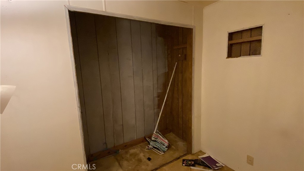 17698 Walker Mine Road Redding, CA 96003 - Photo 23 of 29 a view of a room with a wooden door