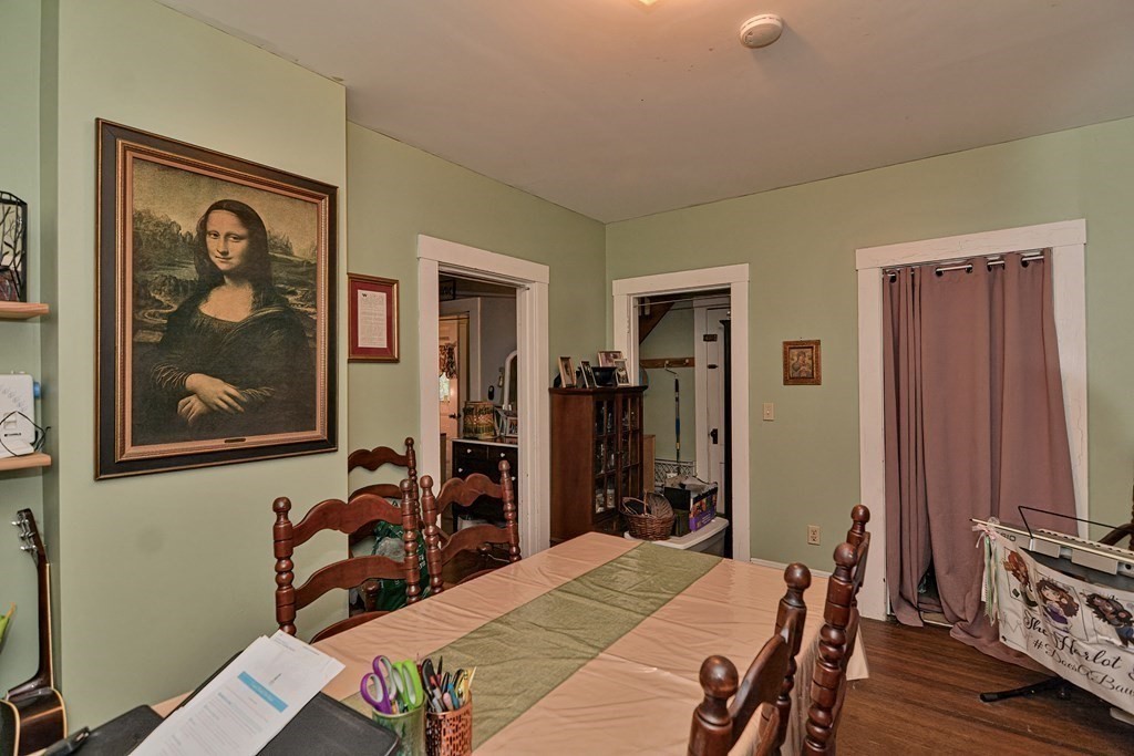 183 Main Street Northampton, MA 01053 - Photo 13 of 42 a bed room with a bed and a desk