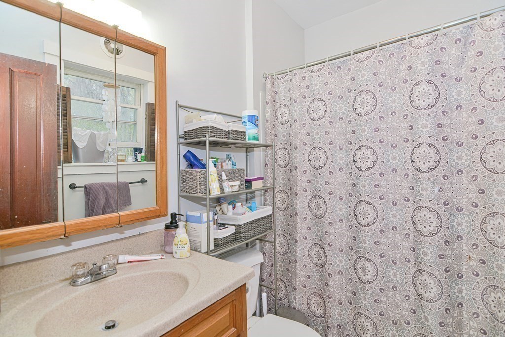 183 Main Street Northampton, MA 01053 - Photo 16 of 42 a bathroom with a sink toilet and shower