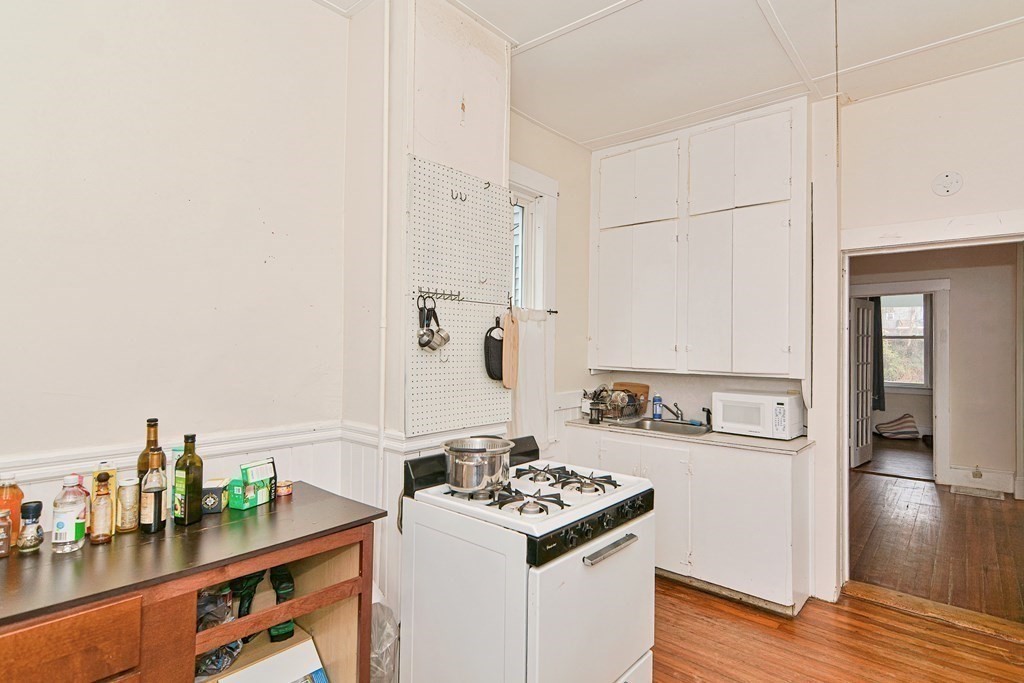 183 Main Street Northampton, MA 01053 - Photo 20 of 42 a kitchen with stainless steel appliances a stove and a refrigerator