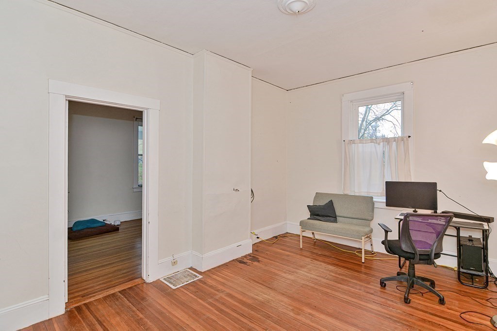 183 Main Street Northampton, MA 01053 - Photo 21 of 42 a view of a workspace with furniture and wooden floor