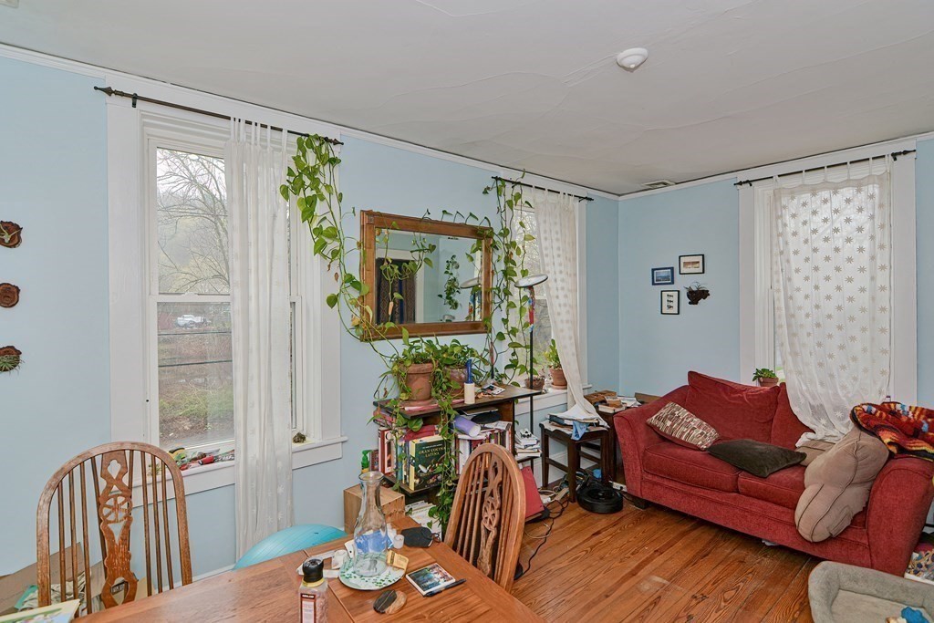 183 Main Street Northampton, MA 01053 - Photo 24 of 42 a living room with furniture and wooden floor