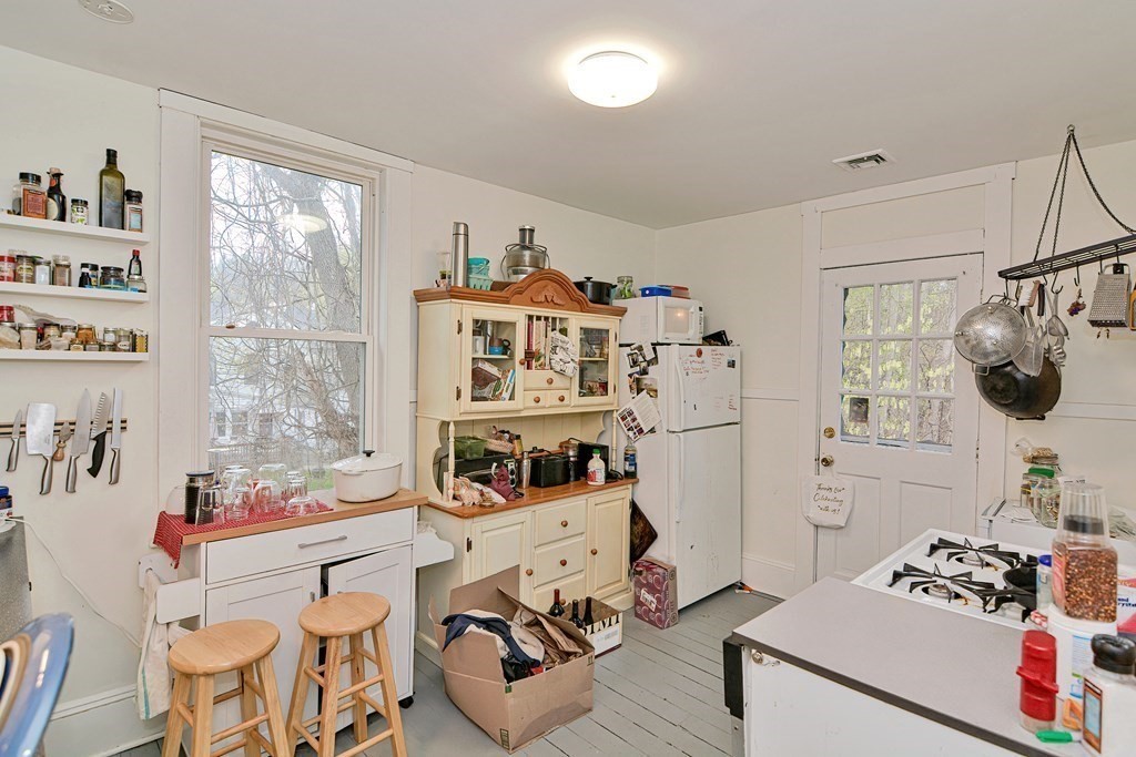 183 Main Street Northampton, MA 01053 - Photo 29 of 42 a bedroom with furniture and a window
