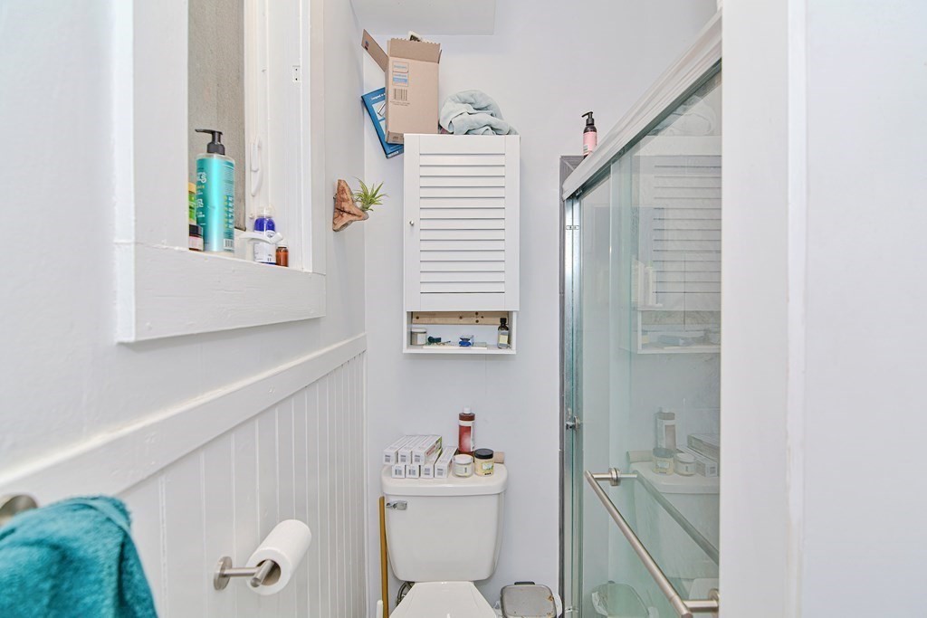 183 Main Street Northampton, MA 01053 - Photo 37 of 42 a bathroom with a sink mirror and toilet