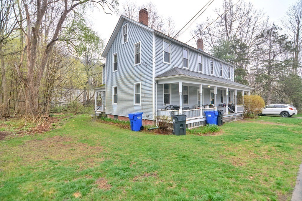 183 Main Street Northampton, MA 01053 - Photo 4 of 42 a view of a house with backyard and sitting area