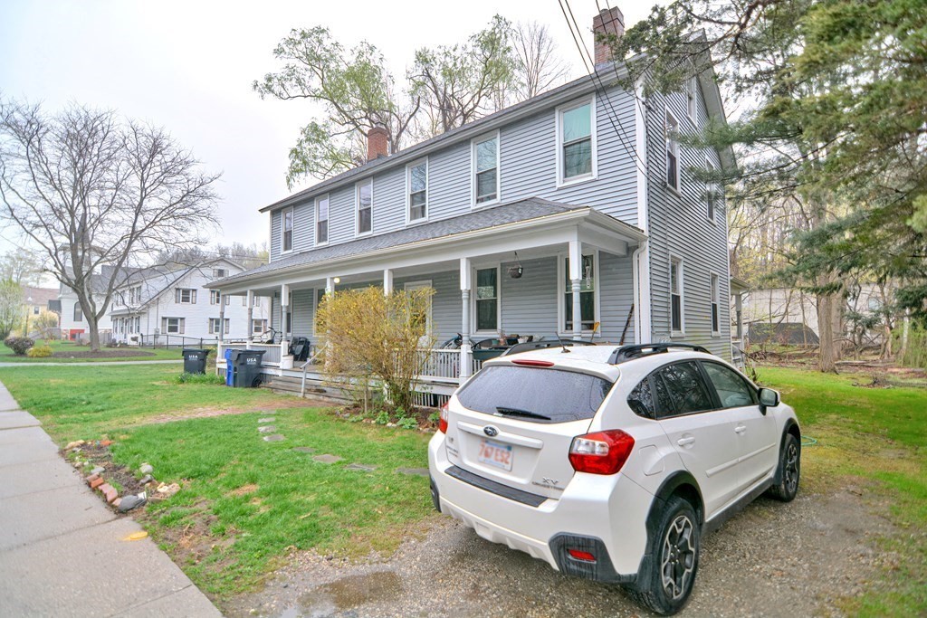 183 Main Street Northampton, MA 01053 - Photo 5 of 42 a house view with a garden space