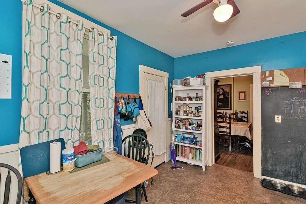 183 Main Street Northampton, MA 01053 - Photo 10 of 42 a bedroom with furniture and a chair