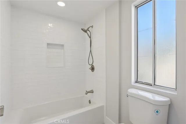 a view of a hallway with staircase