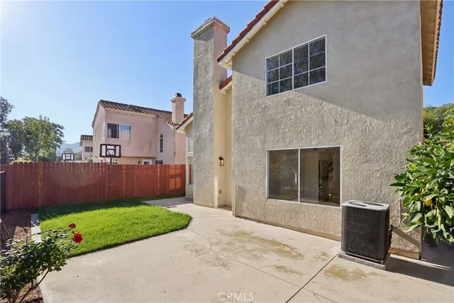 a view of backyard with green space
