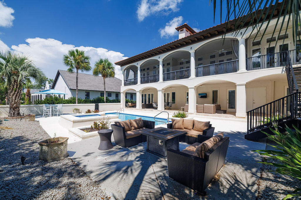 2940 Pine Valley Road Miramar Beach, FL 32550 - Photo 24 of 97 a swimming pool with outdoor seating