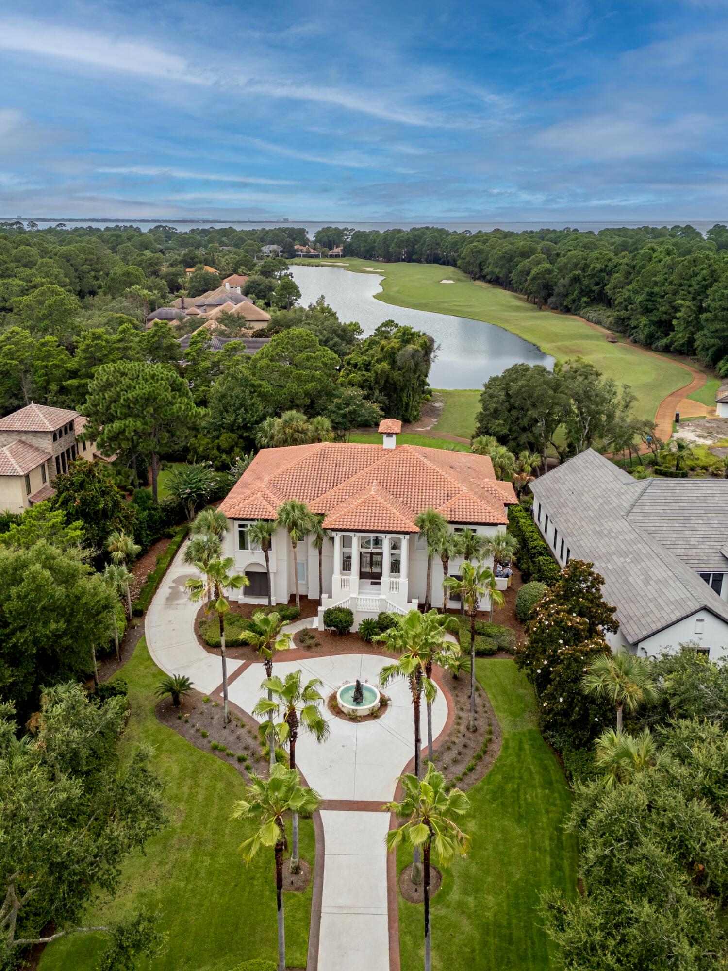 2940 Pine Valley Road Miramar Beach, FL 32550 - Photo 4 of 97 a view of a lake with a mountain in the background