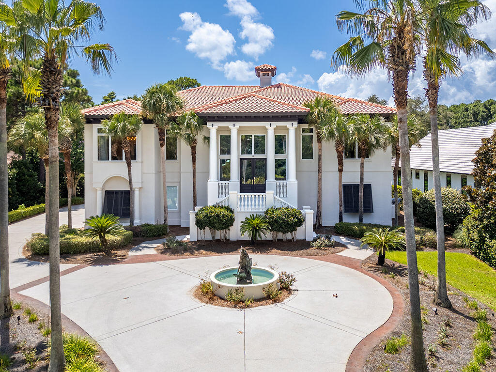2940 Pine Valley Road Miramar Beach, FL 32550 - Photo 6 of 97 a front view of a house with swimming pool and porch with furniture