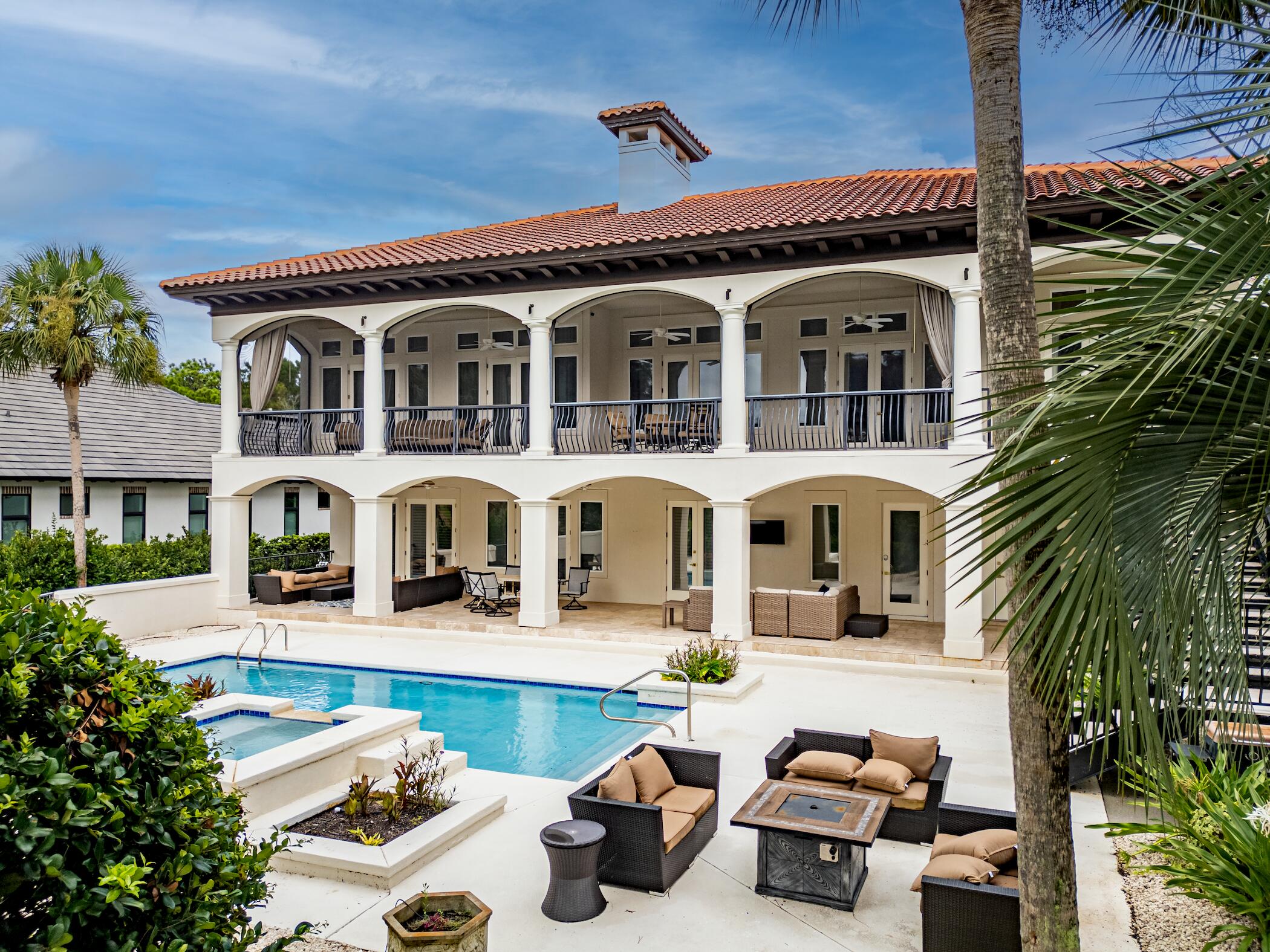 2940 Pine Valley Road Miramar Beach, FL 32550 - Photo 8 of 97 a front view of a house with garden
