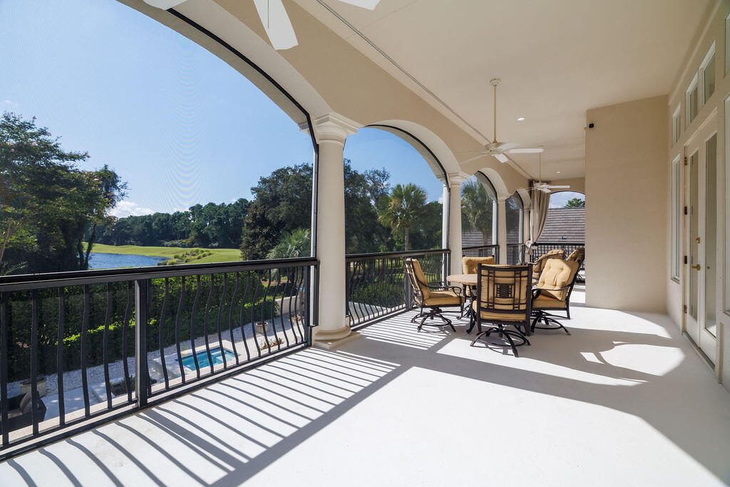 2940 Pine Valley Road Miramar Beach, FL 32550 - Photo 84 of 97 a view of a chairs and tables in the balcony