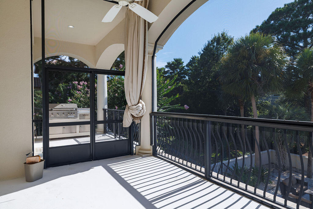 2940 Pine Valley Road Miramar Beach, FL 32550 - Photo 88 of 97 a view of balcony with wooden floor and outdoor seating