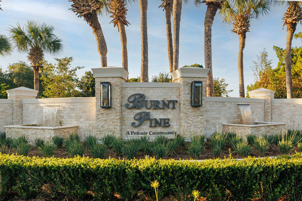 2940 Pine Valley Road Miramar Beach, FL 32550 - Photo 92 of 97 a view of a lake with a garden and lake view