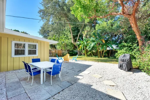a view of balcony with wooden floor and fence