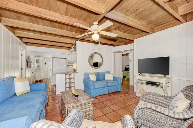 a kitchen with granite countertop a refrigerator and a stove