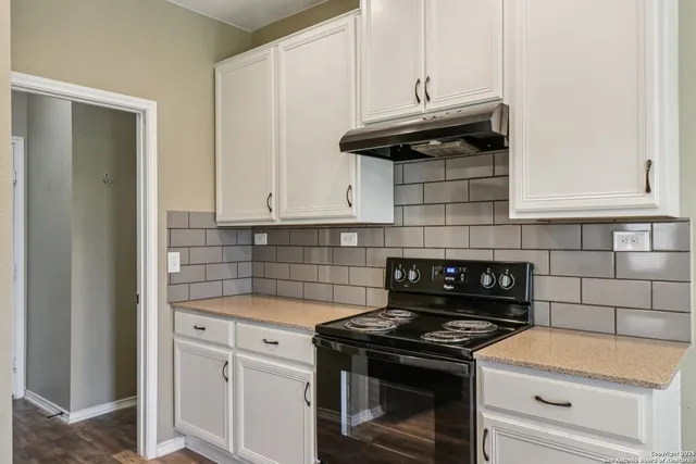 a view of livingroom with window and hardwood floor