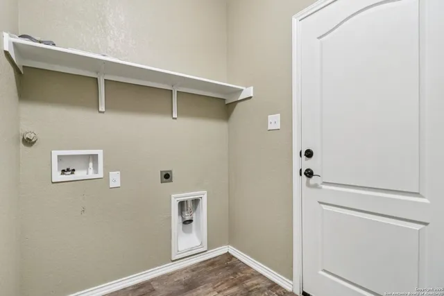 a bathroom with a sink a mirror and a shower