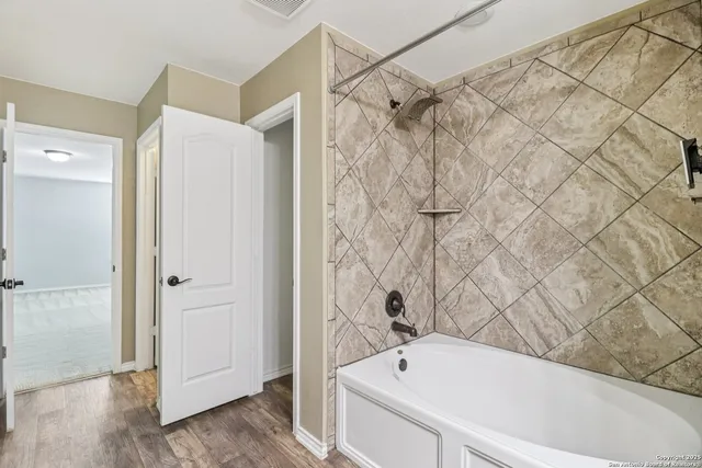 a view of a room with racks on the wall