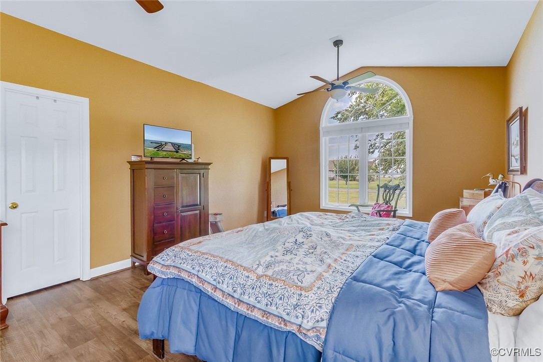 324 Potomac Drive Heathsville, VA 22473 - Photo 25 of 50 a bedroom with a bed and dresser with mirror