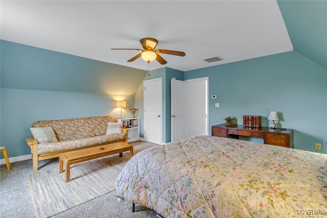 324 Potomac Drive Heathsville, VA 22473 - Photo 34 of 50 a bedroom with furniture and a couch