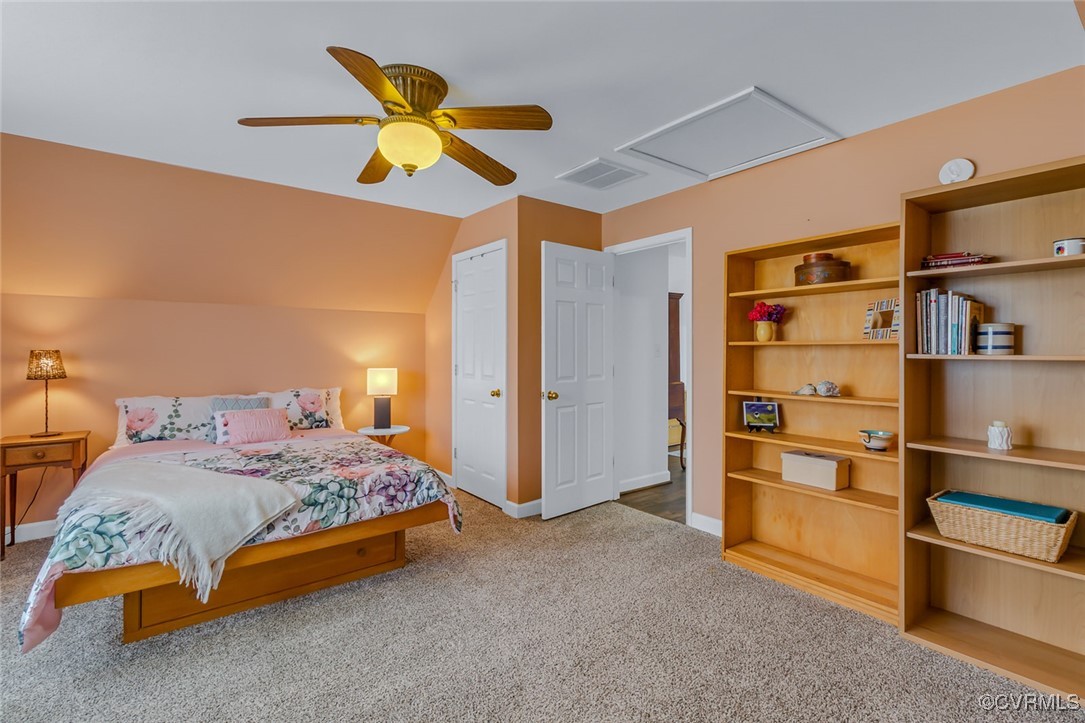 324 Potomac Drive Heathsville, VA 22473 - Photo 37 of 50 a bedroom with a bed and a cabinets