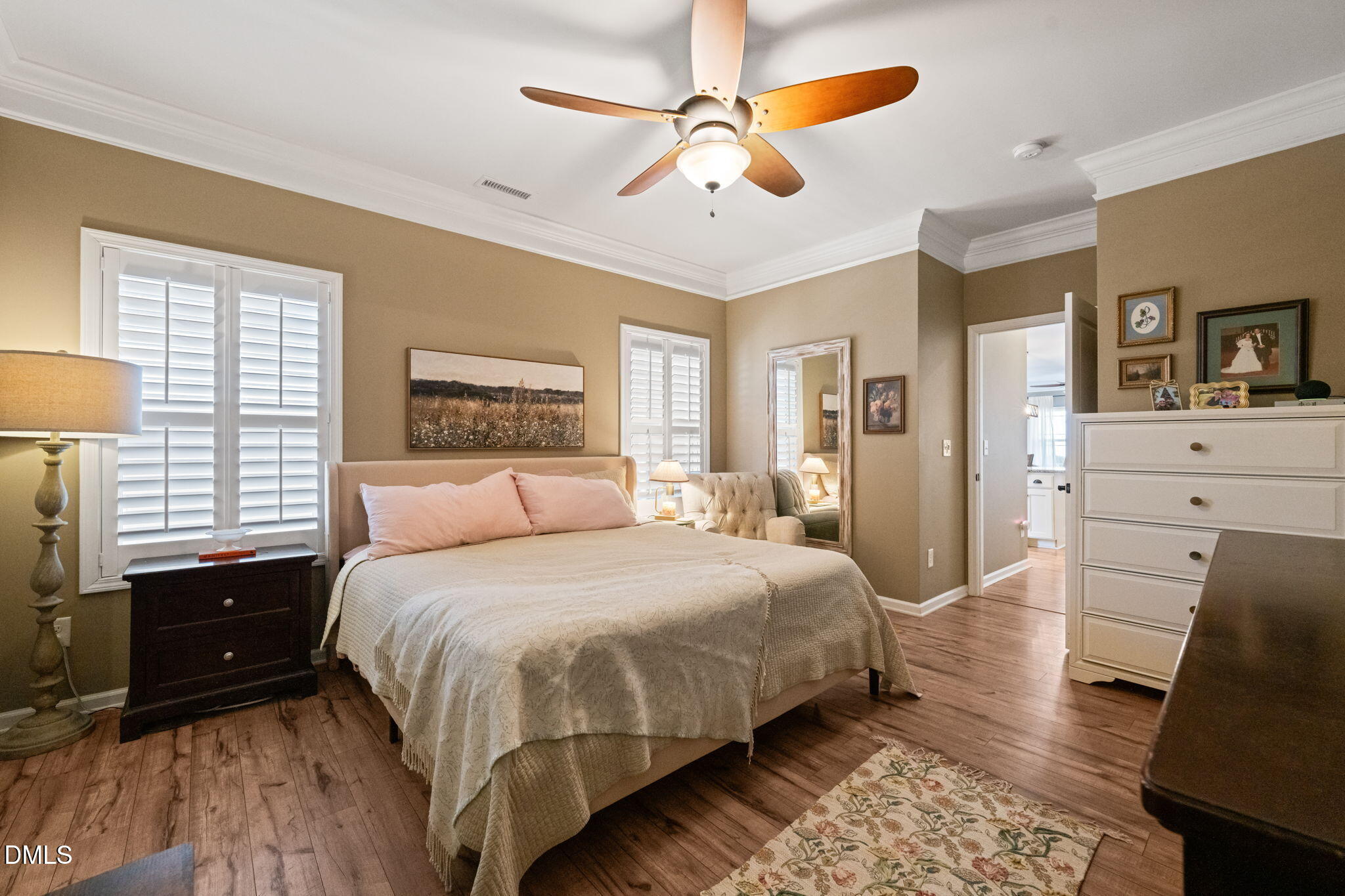 1716 Main Divide Drive Wake Forest, NC 27587 - Photo 19 of 45 a bedroom with a bed mirror and a window