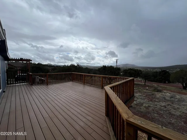a white toilet sitting next to a shower