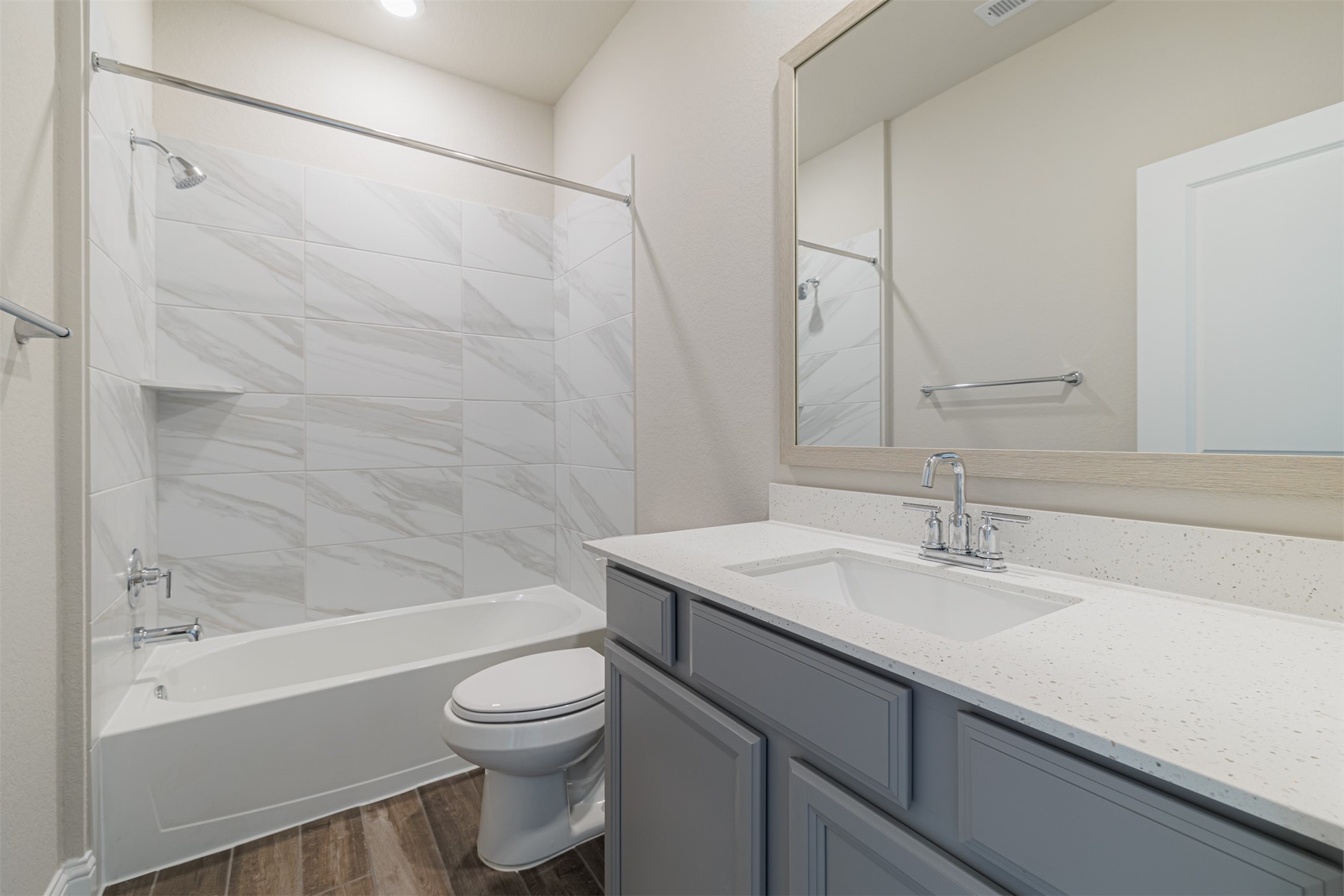 12611 White Pelican Court Cypress, TX 77433 - Photo 23 of 24 a bathroom with a sink a toilet and a bathtub