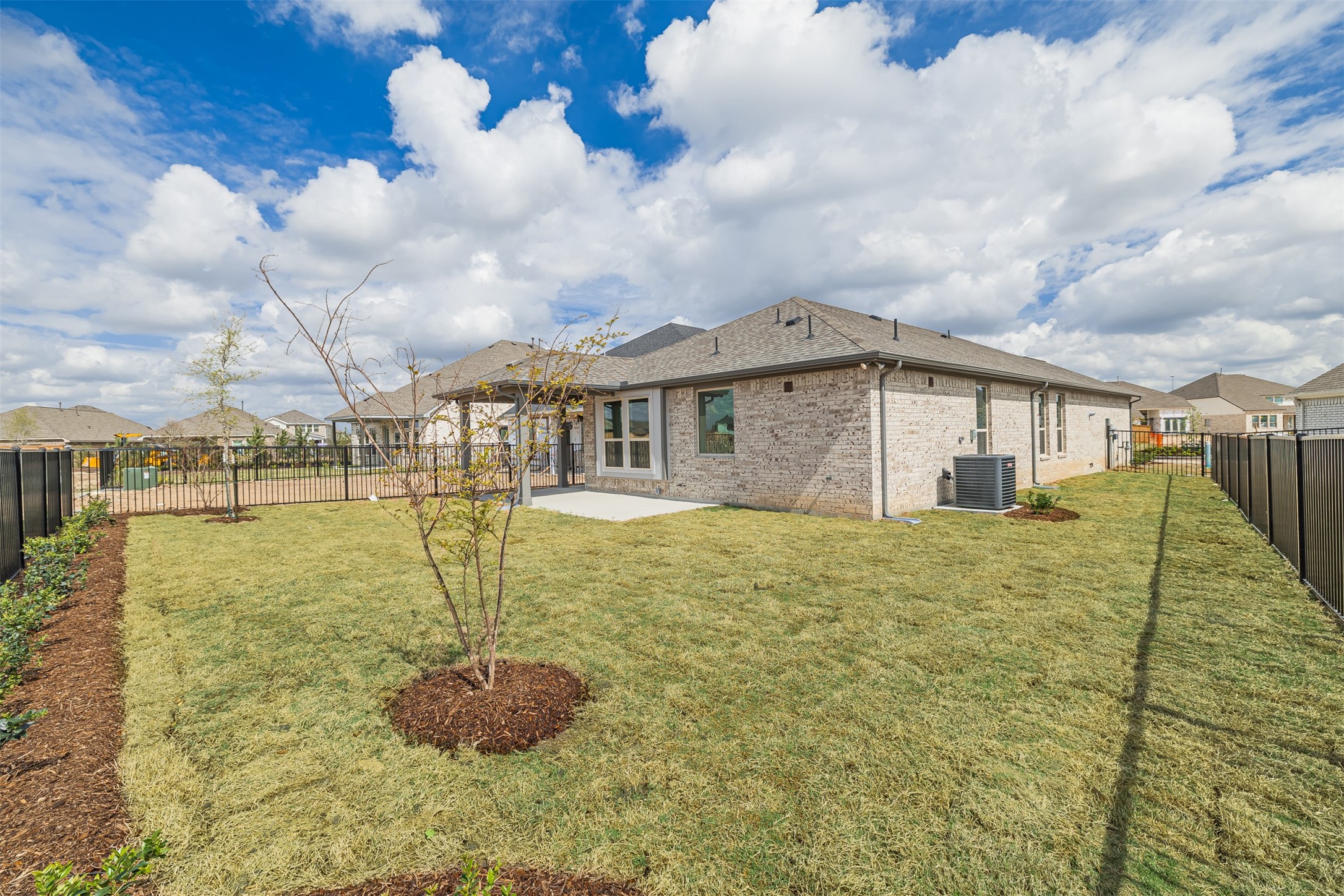12611 White Pelican Court Cypress, TX 77433 - Photo 24 of 24 a large pool with some trees in the background