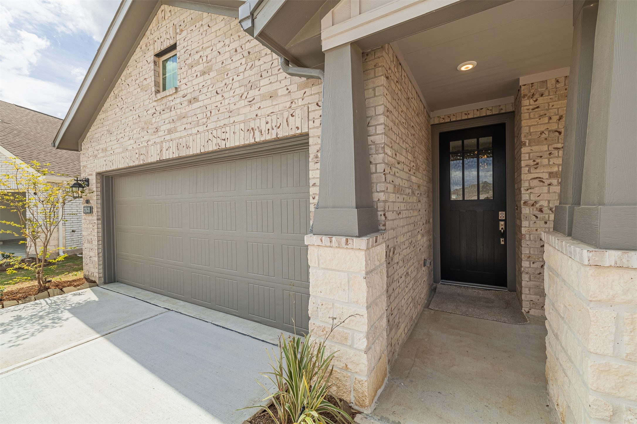 12611 White Pelican Court Cypress, TX 77433 - Photo 3 of 24 a view of entryway with a front door and wooden floor