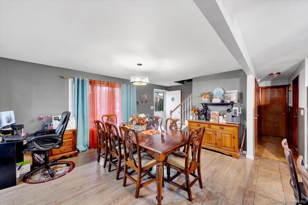 65 Clearview Drive Bridgeport, CT 06606 - Photo 21 of 25 a view of a dining room with furniture and a window