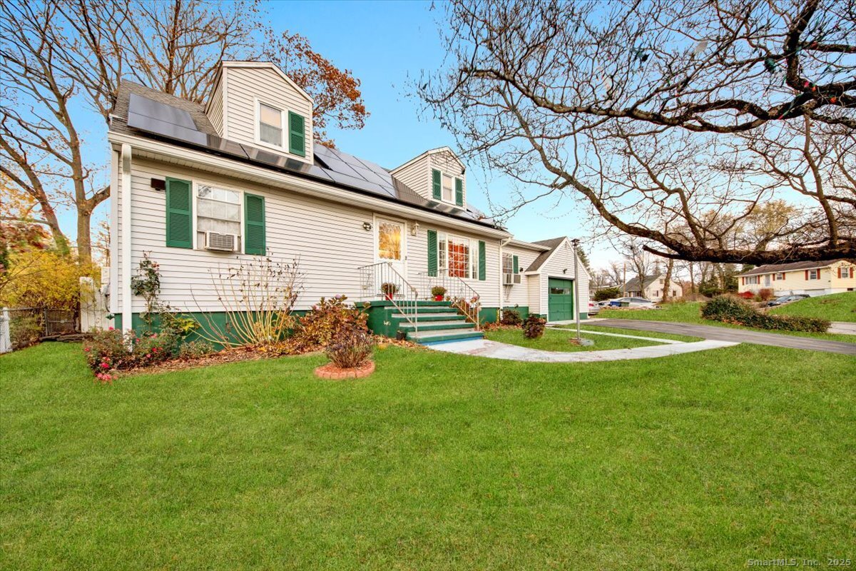 65 Clearview Drive Bridgeport, CT 06606 - Photo 3 of 25 a view of a house with a backyard
