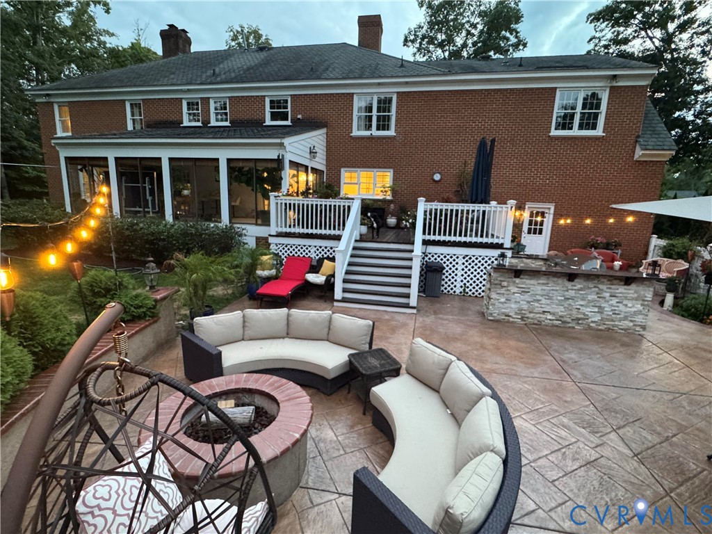 9006 Brieryle Road Henrico, VA 23229 - Photo 6 of 6 Expansive stamped concrete patio featuring a built