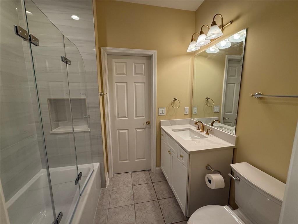 3316 Keenland Road Marietta, GA 30062 - Photo 25 of 54 a bathroom with a sink toilet and shower